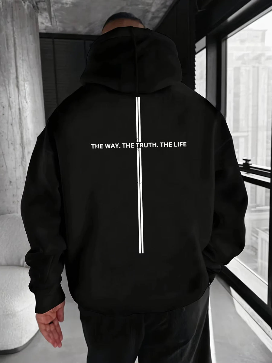 Avslappet, romslig hettegenser for menn med tekstmotiv og vertikal stripe på ryggen