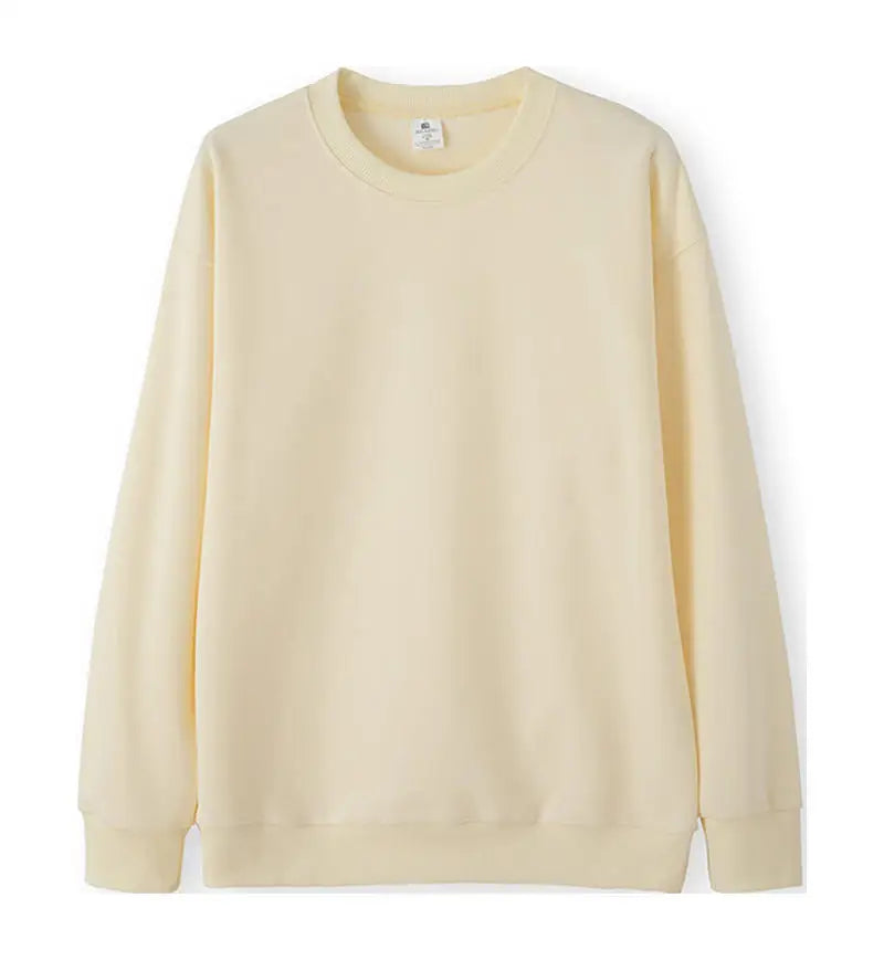 Avslappnad unisex sweatshirt med rund hals, långa ärmar och enfärgad design