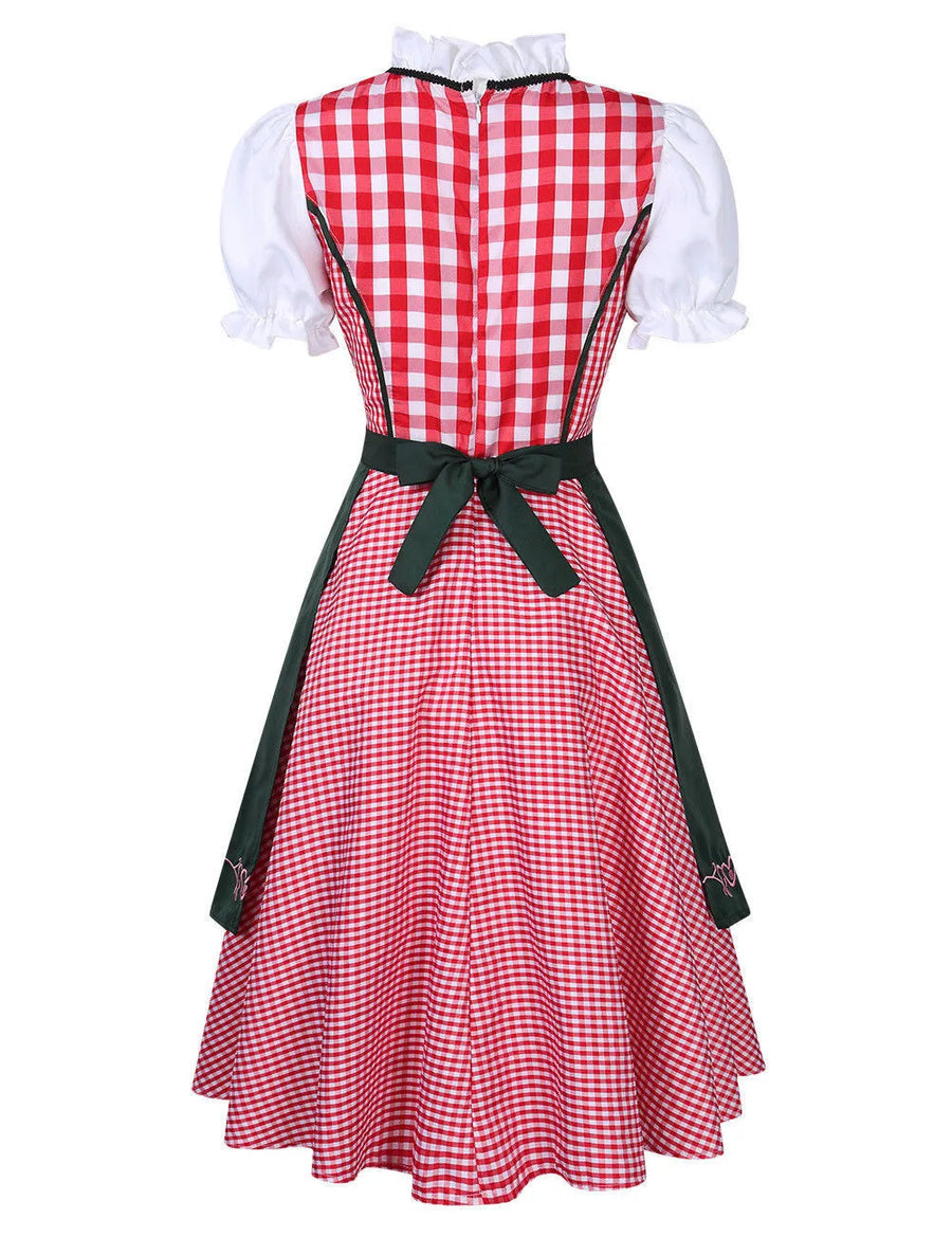 Traditionel dirndl-kjole med ternet mønster, korset og forklæde til kvinder