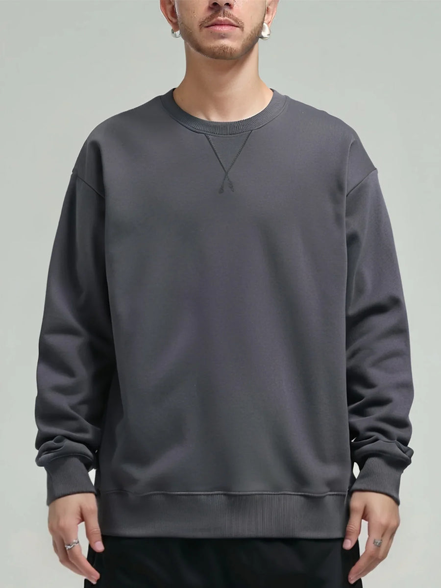Ensfarvet sweatshirt med rund hals og lange ærmer