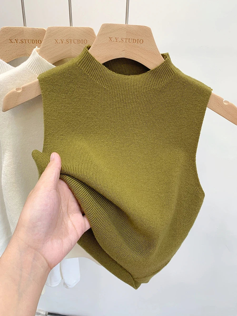 Women's plain knitted sleeveless turtleneck