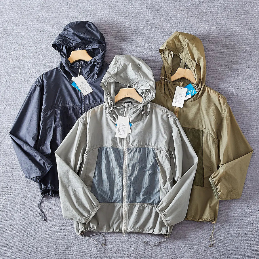 Giacca leggera unisex con cappuccio e inserti traspiranti