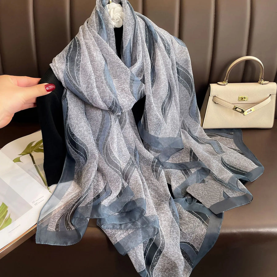 Lightweight women's scarf with landscape or floral patterns