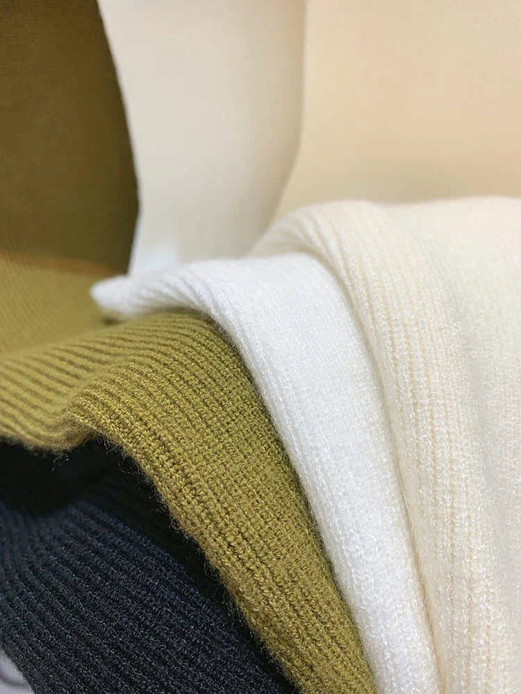 Women's plain knitted sleeveless turtleneck