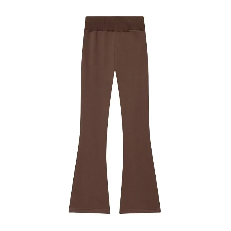 Casual sportieve damesoutfit - kort jack met rits en broek met uitlopende pijpen en hoge taille