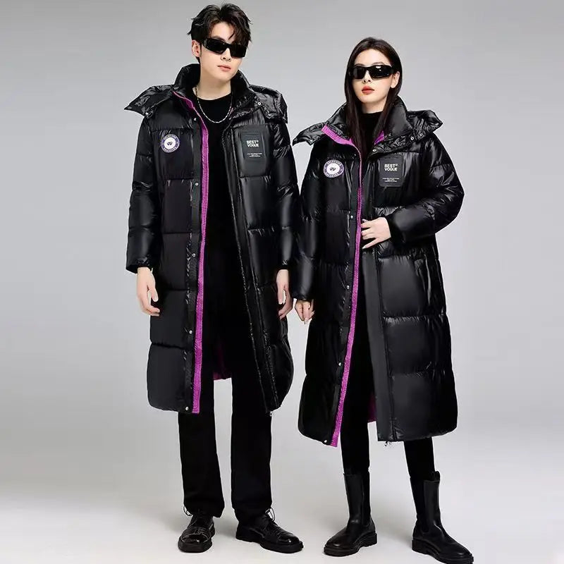Plumífero largo negro acolchado unisex con capucha
