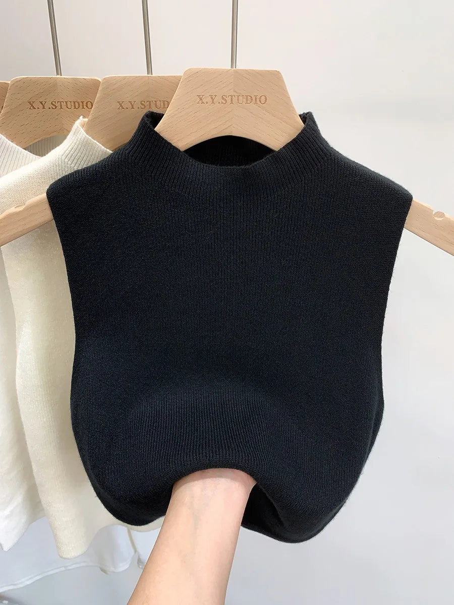 Women's plain knitted sleeveless turtleneck
