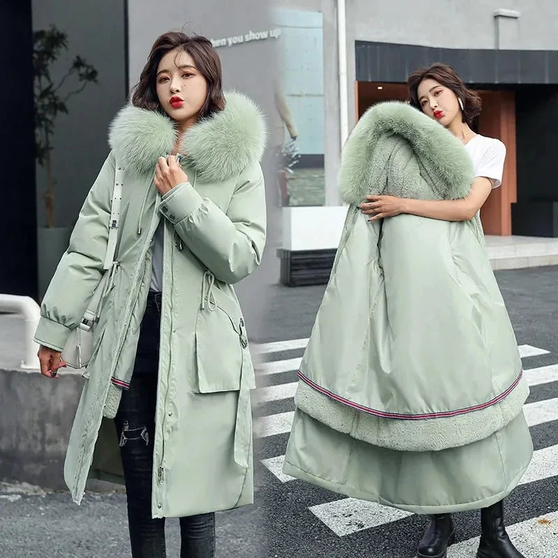 Women's long quilted parka coat with a faux-fur-trimmed hood and removable lining