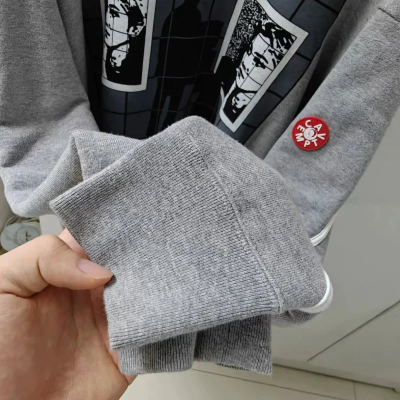 Unisex crew-neck sweatshirt with a graphic design, available in several colors and sizes