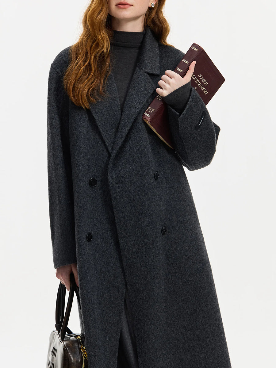 Women's straight-cut, double-breasted wrap coat in a solid color