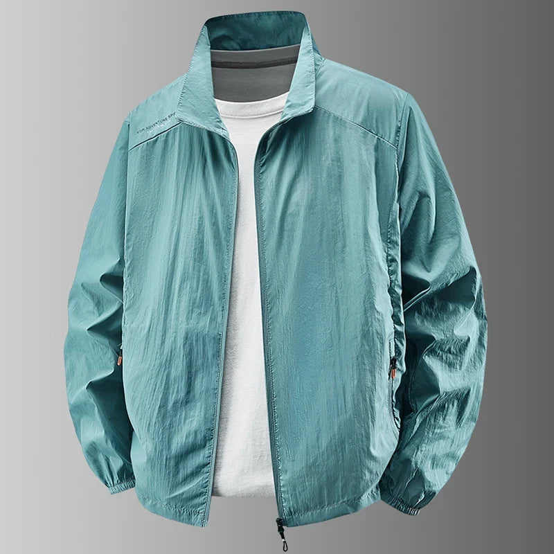 Chaqueta ligera lisa para hombre, cuello alto, corte informal y cierre de cremallera