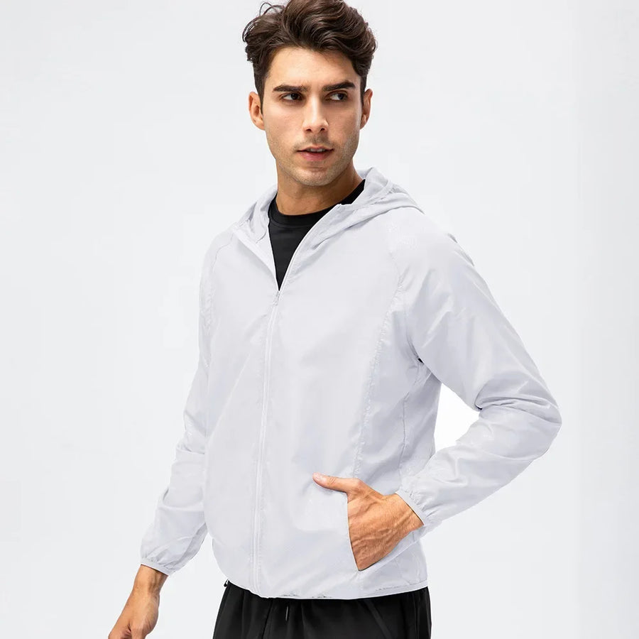 Veste coupe-vent légère à capuche pliable pour homme