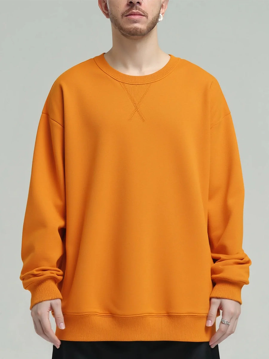 Ensfarvet sweatshirt med rund hals og lange ærmer