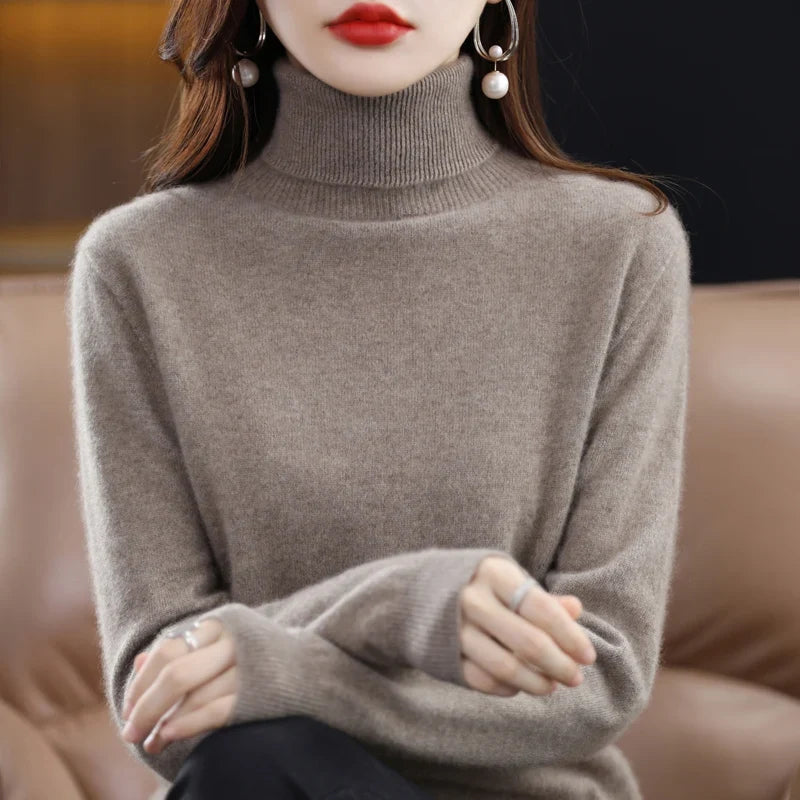 Jersey de mujer de cuello vuelto y mangas largas en color liso