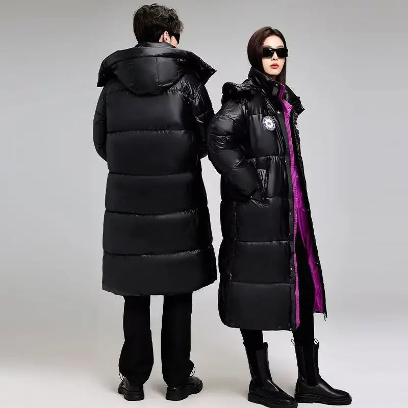Plumífero largo negro acolchado unisex con capucha