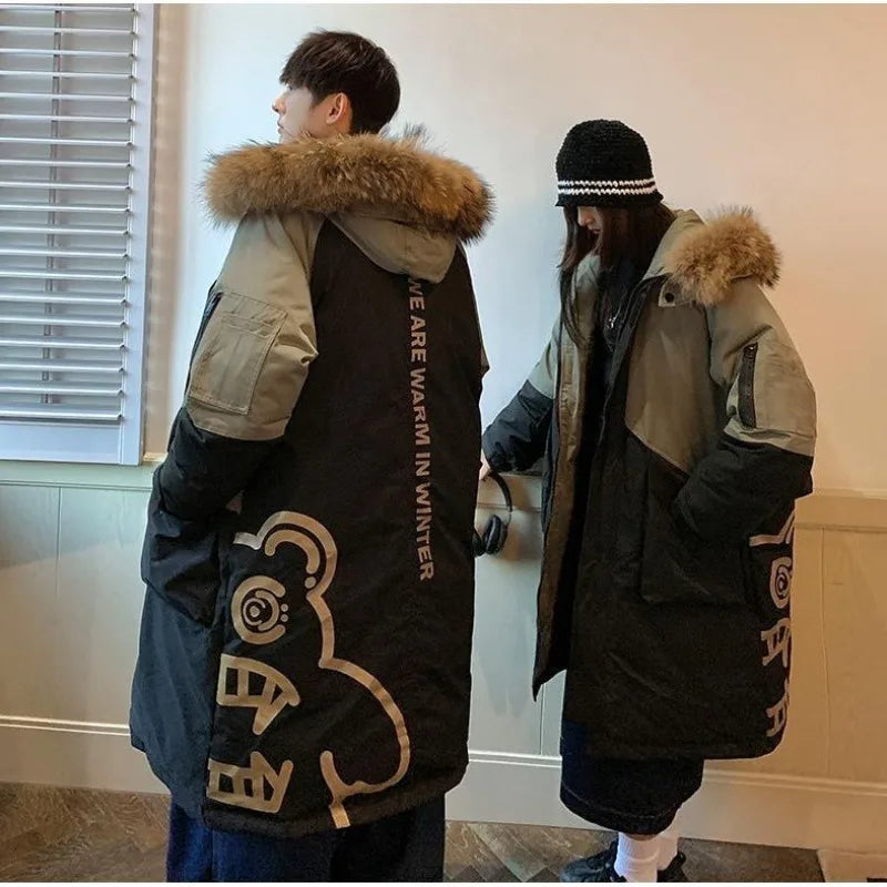 Doudoune longue unisexe bicolore kaki et beige avec capuche à fausse fourrure
