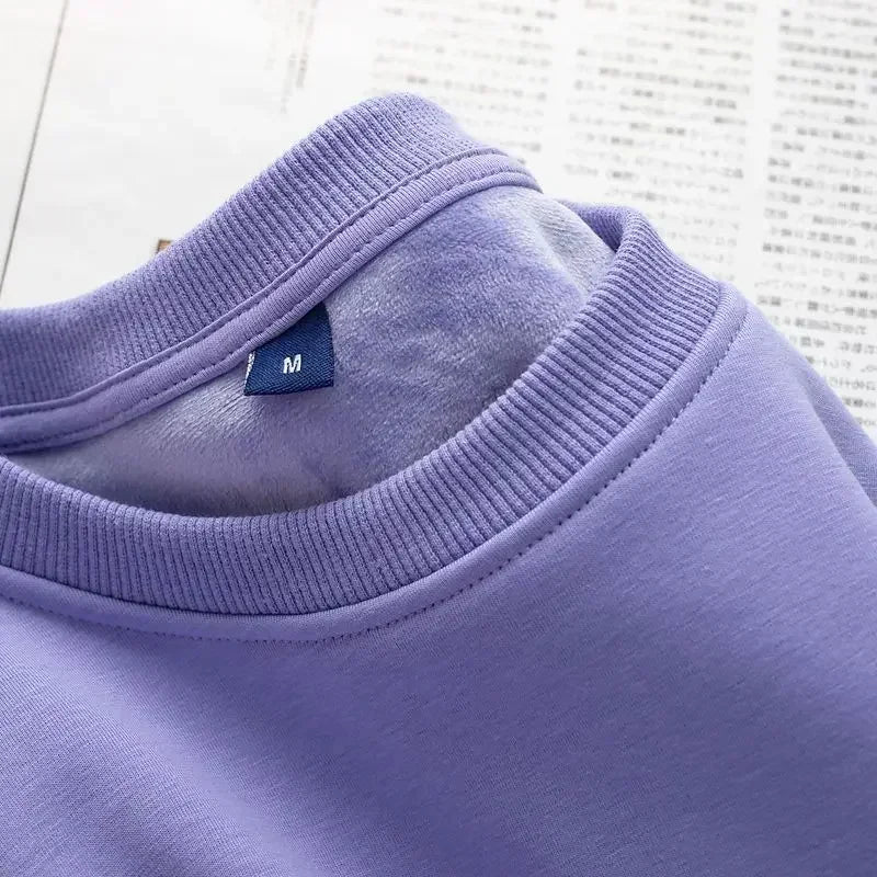 Sweat-shirt col rond doublure douce aspect peluche couleur unie