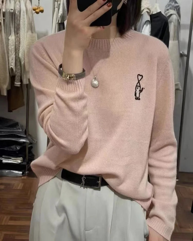 Maglione da donna con collo rotondo, motivo ricamato e colori a tinta unita