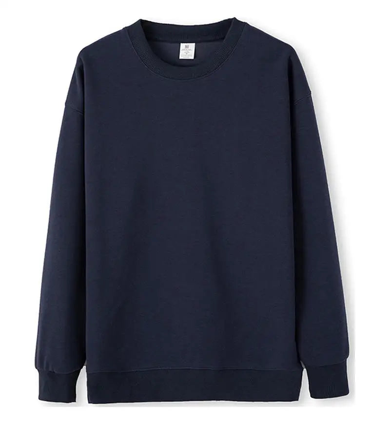Avslappnad unisex sweatshirt med rund hals, långa ärmar och enfärgad design