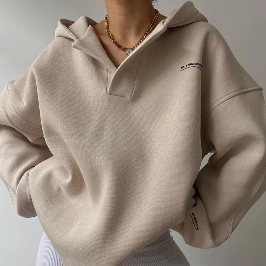 Oversized hettegenser med tykk V-hals i ensfarget design