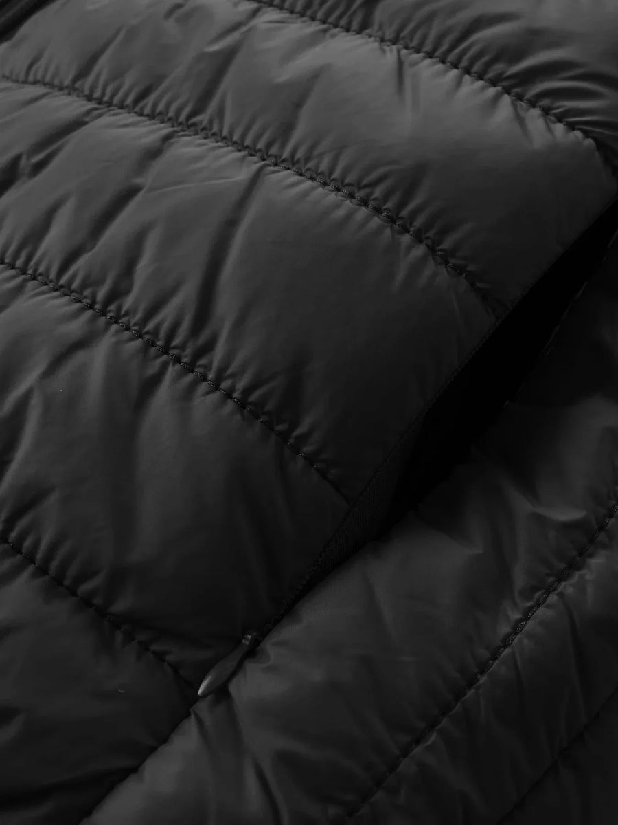 Plumífero ligero acolchado con capucha para hombre y mujer