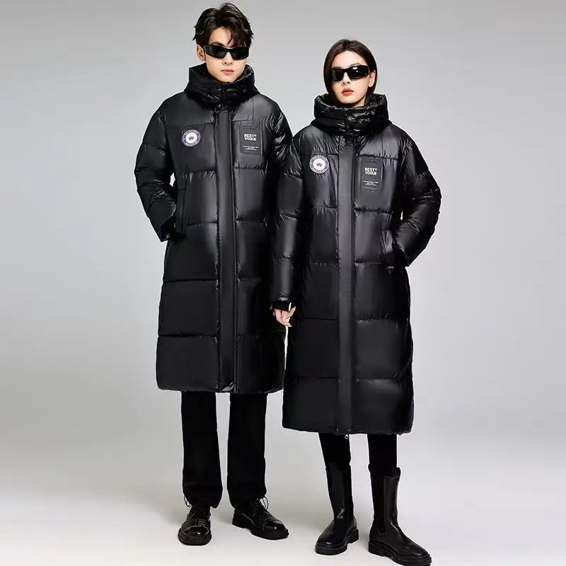 Plumífero largo negro acolchado unisex con capucha