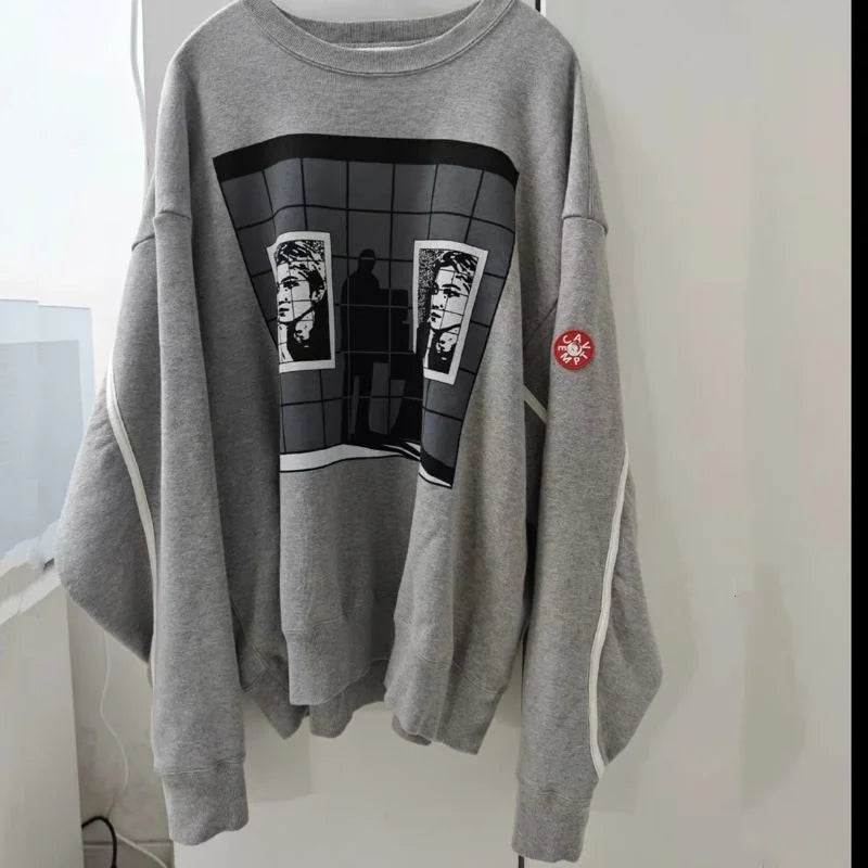 Unisex crew-neck sweatshirt with a graphic design, available in several colors and sizes