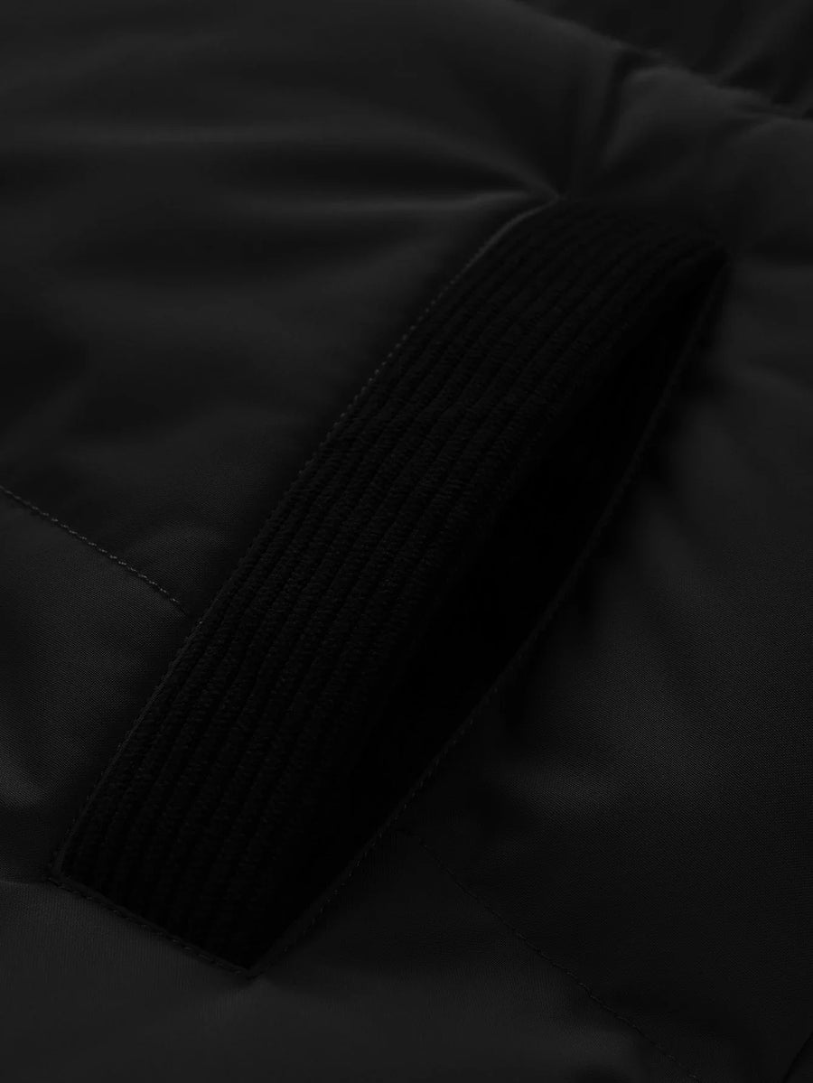Black two-tone quilted hooded puffer jacket with corduroy-style design