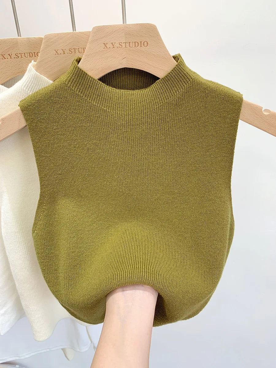 Women's plain knitted sleeveless turtleneck
