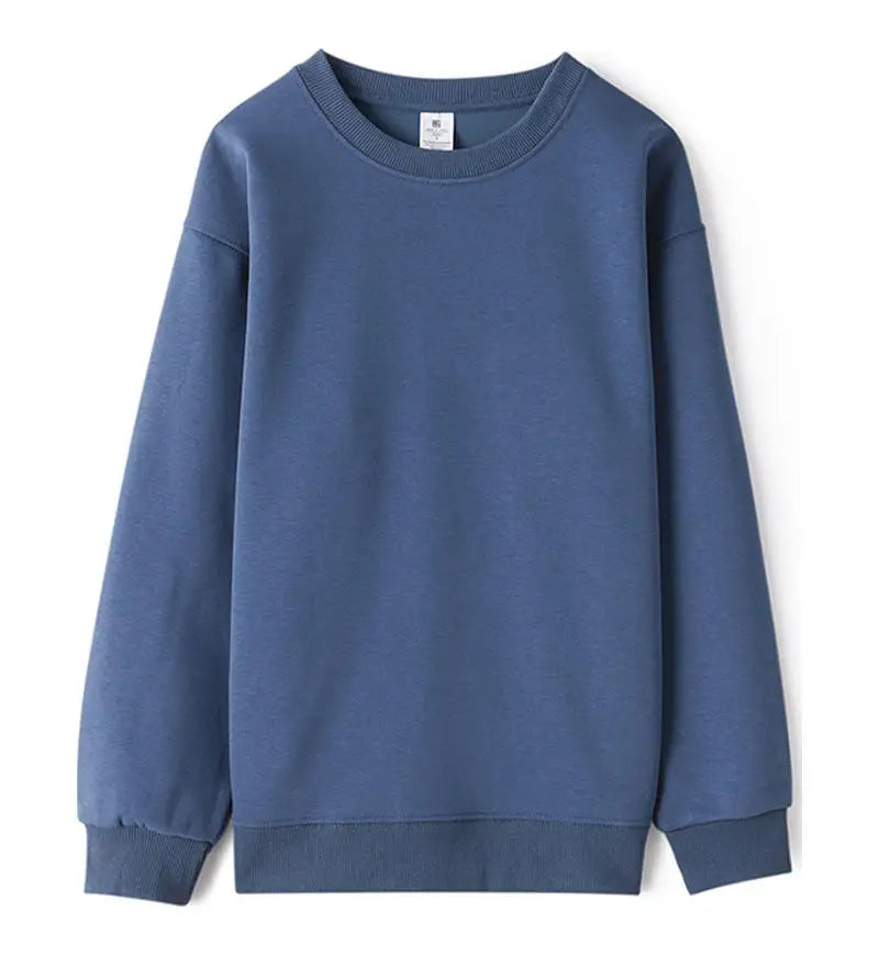 Avslappnad unisex sweatshirt med rund hals, långa ärmar och enfärgad design
