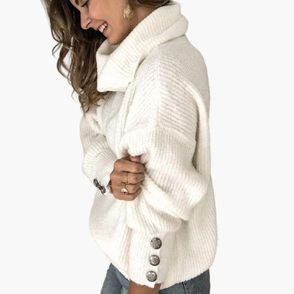 Dam polotröja med dekorativa knappar, chic för avslappnad eller elegant look