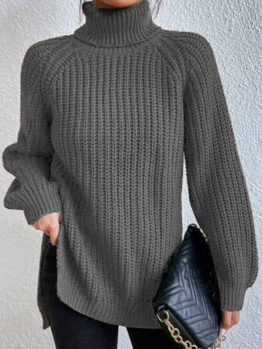 Damen-Rollkragenpullover aus lockerem Rippstrick mit Raglanärmeln und seitlichen Schlitzen