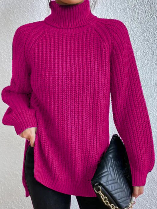 Damen-Rollkragenpullover aus lockerem Rippstrick mit Raglanärmeln und seitlichen Schlitzen