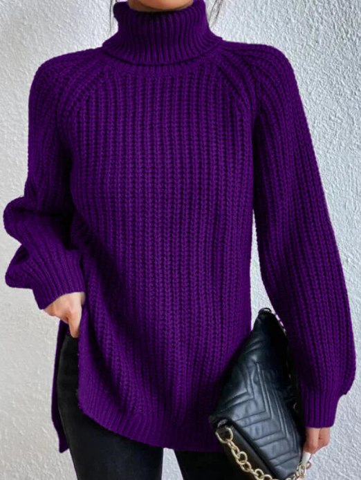 Damen-Rollkragenpullover aus lockerem Rippstrick mit Raglanärmeln und seitlichen Schlitzen