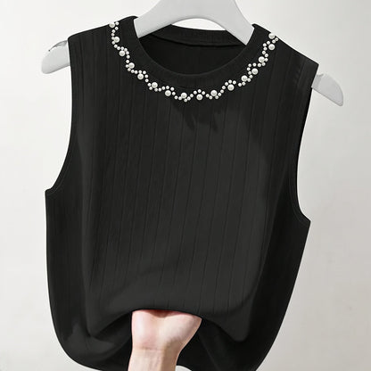 Elegante dames mouwloze top met parelmoerlook en ronde hals, geschikt voor uitgaan of kantoor