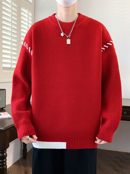 Pull col rond côtelé rouge avec détails contrastants