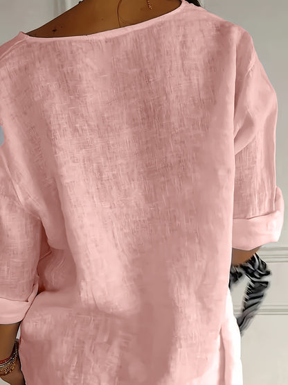 Afslappet damebluse med knapper i elegant og alsidig stil