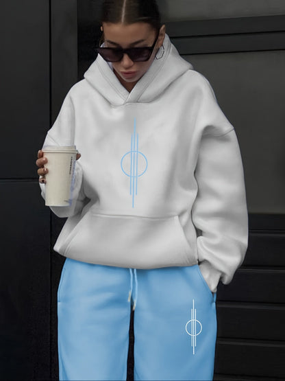 Ensemble survêtement femme blanc et violet motif géométrique
