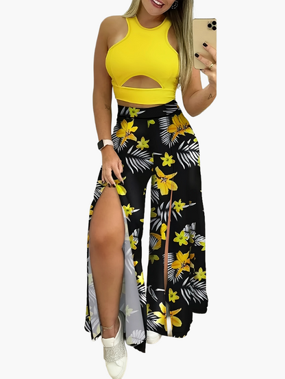 Damesensemble met lange rok met split en tropische print en elegante cropped top voor de zomer