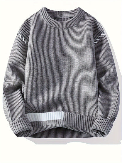 Pull col rond côtelé rouge avec détails contrastants
