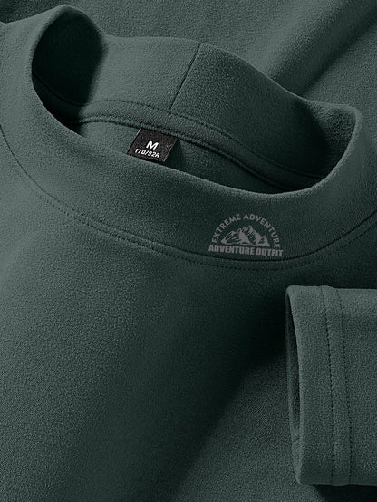 Haut à col montant doux couleur unie manches longues pour homme