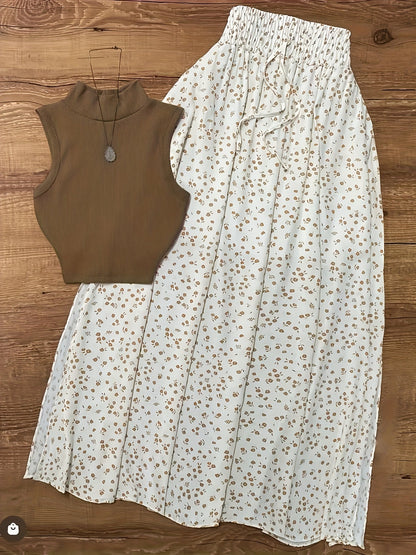 Camiseta sin mangas con cuello alto para mujer, estilo moderno para un look casual o elegante