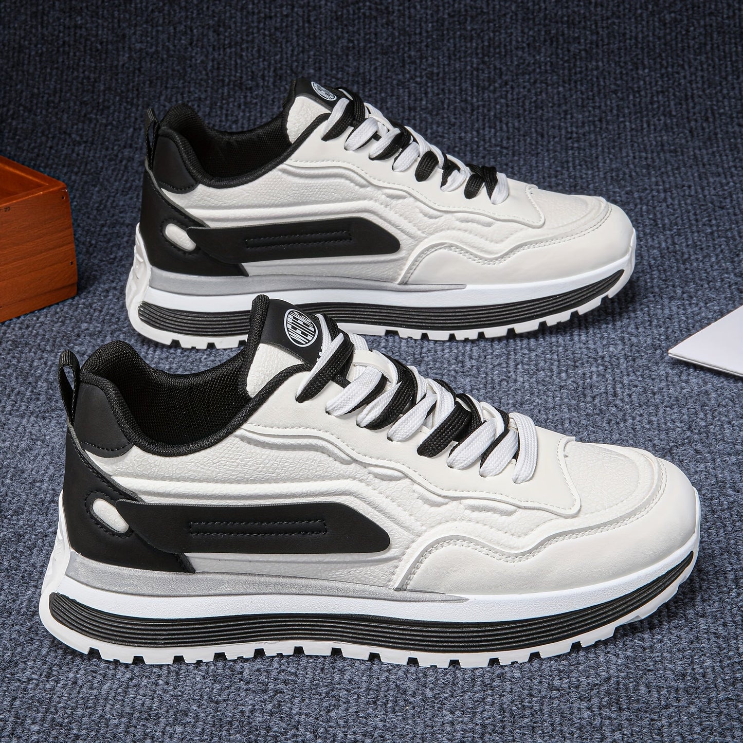 Baskets basses bicolores pour homme semelle épaisse lacets