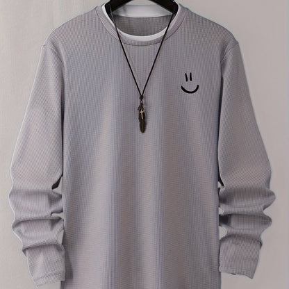 Pull homme texturé gaufré manches longues imprimé smiley col rond