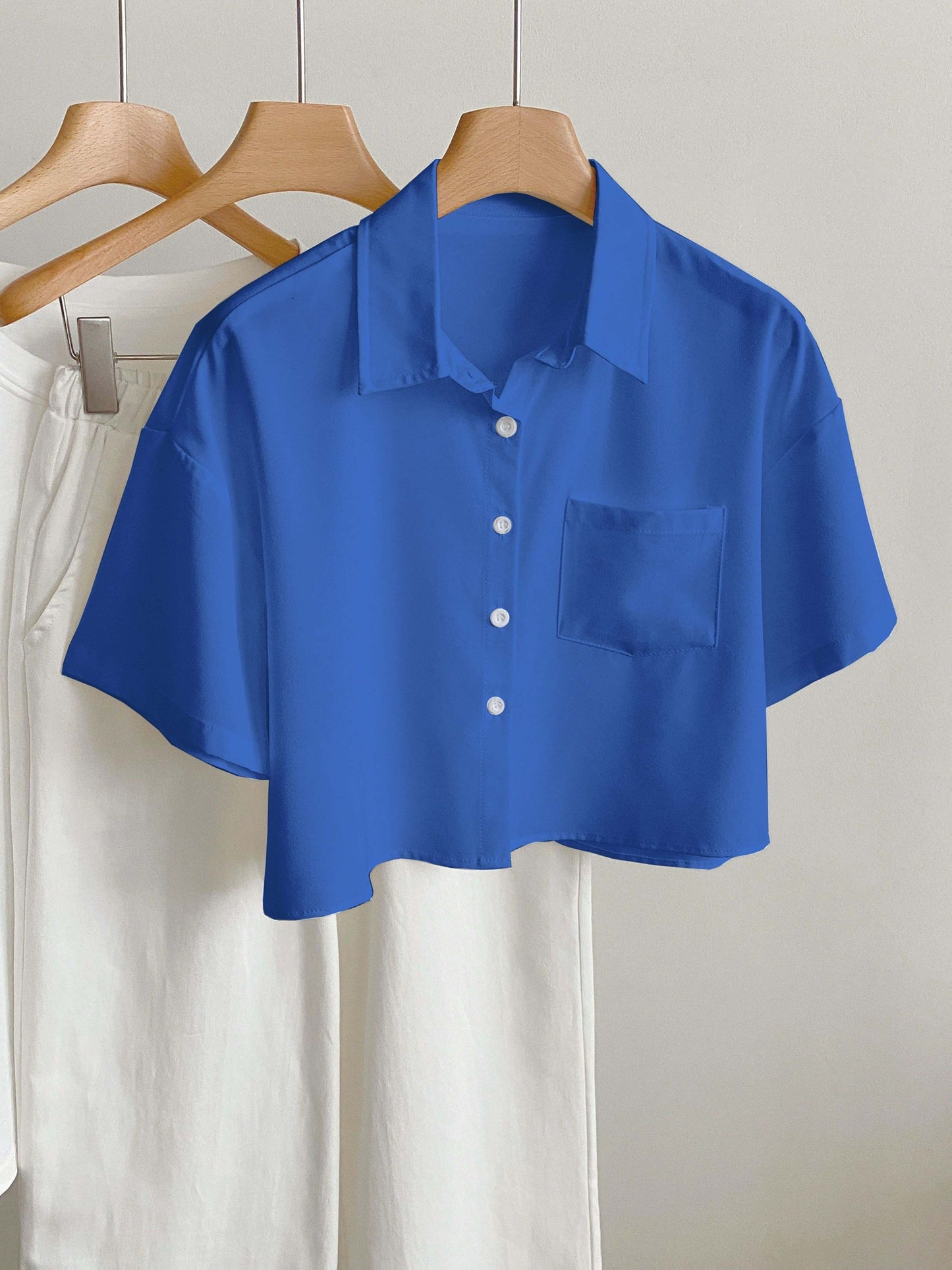 Camicia casual donna maniche corte stile moderno con orlo corto