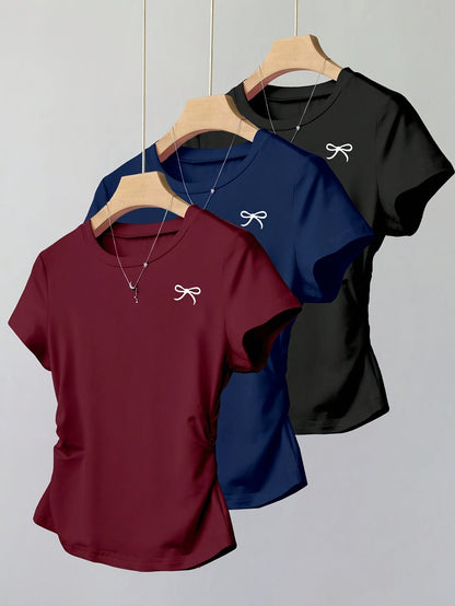 T-shirt femme casual chic à manches courtes avec nœud brodé, style élégant pour usage quotidien