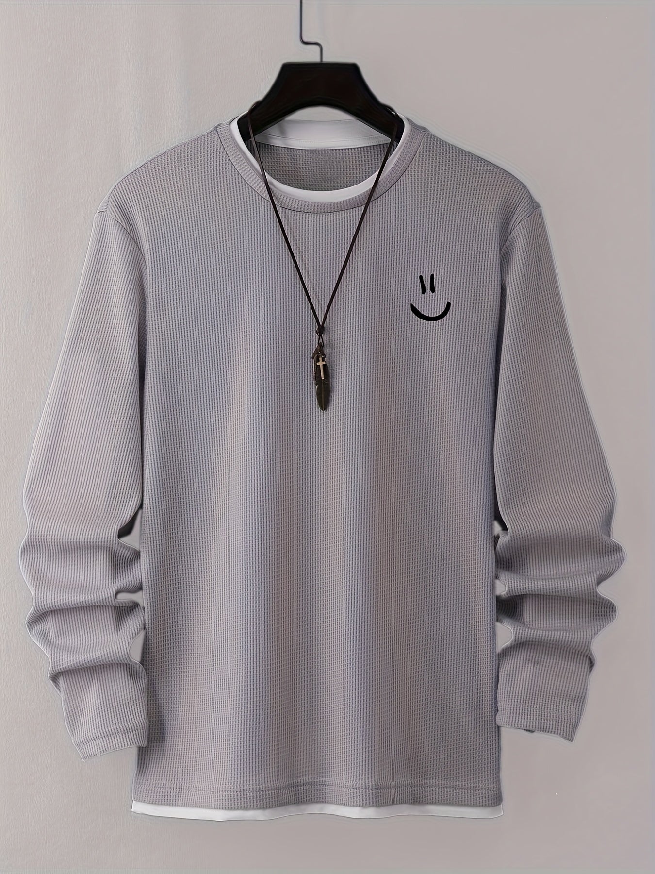 Pull homme texturé gaufré manches longues imprimé smiley col rond