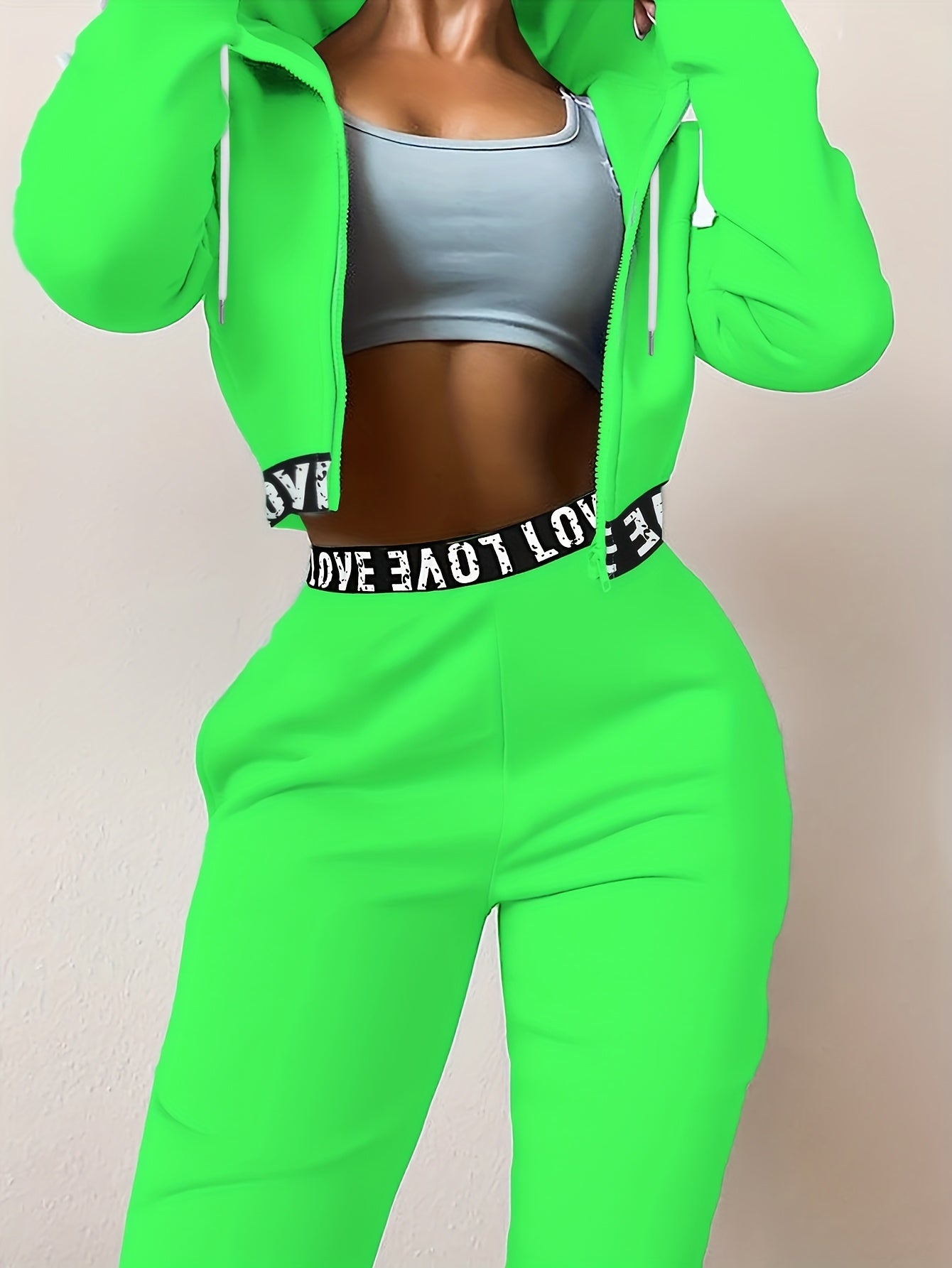 Ensemble survêtement femme crop top à capuche et pantalon large couleur unie