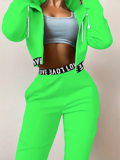 Ensemble survêtement femme crop top à capuche et pantalon large couleur unie