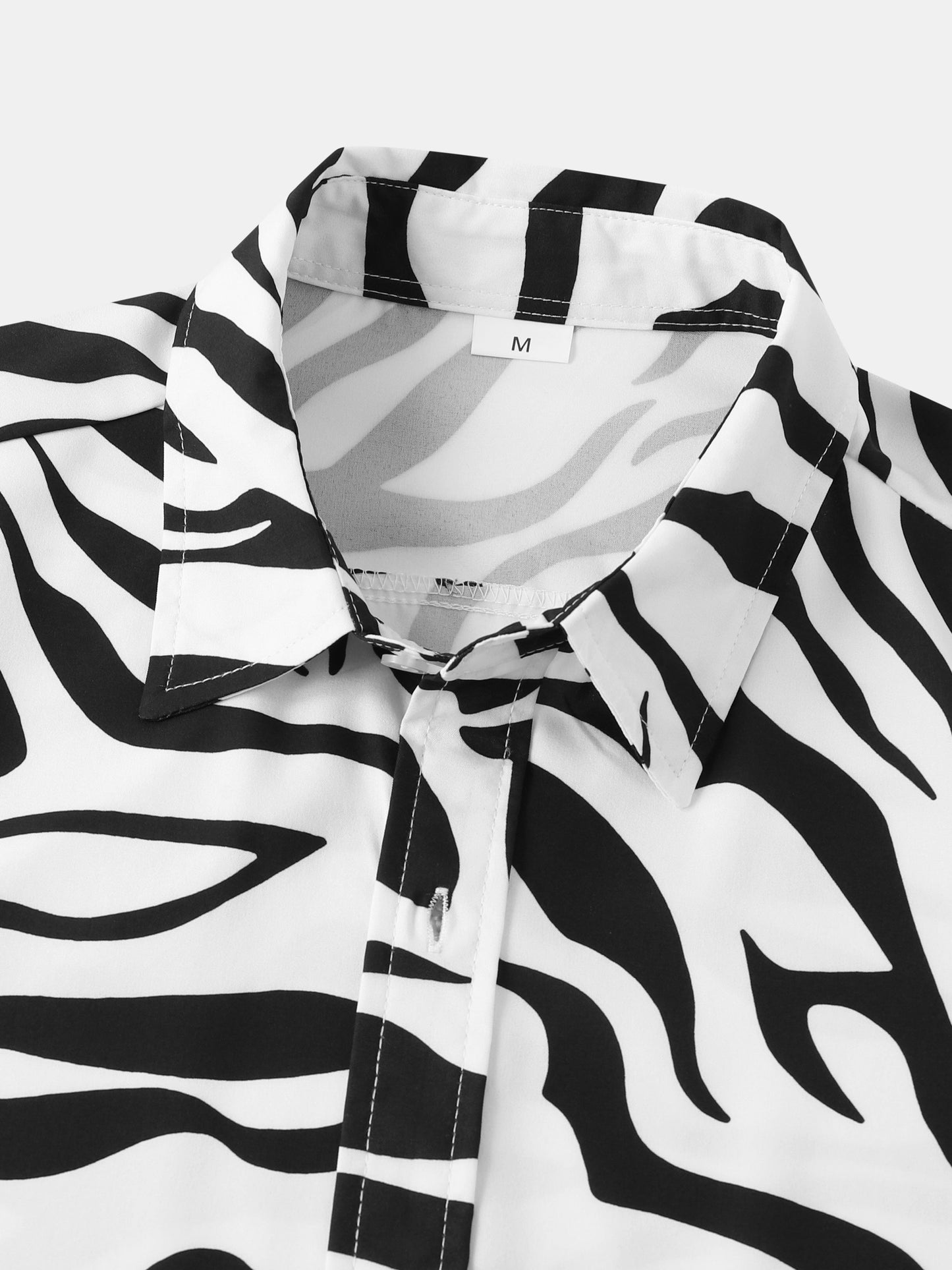 Camicia uomo a maniche corte stile resort con motivo zebrato di tendenza per l'estate